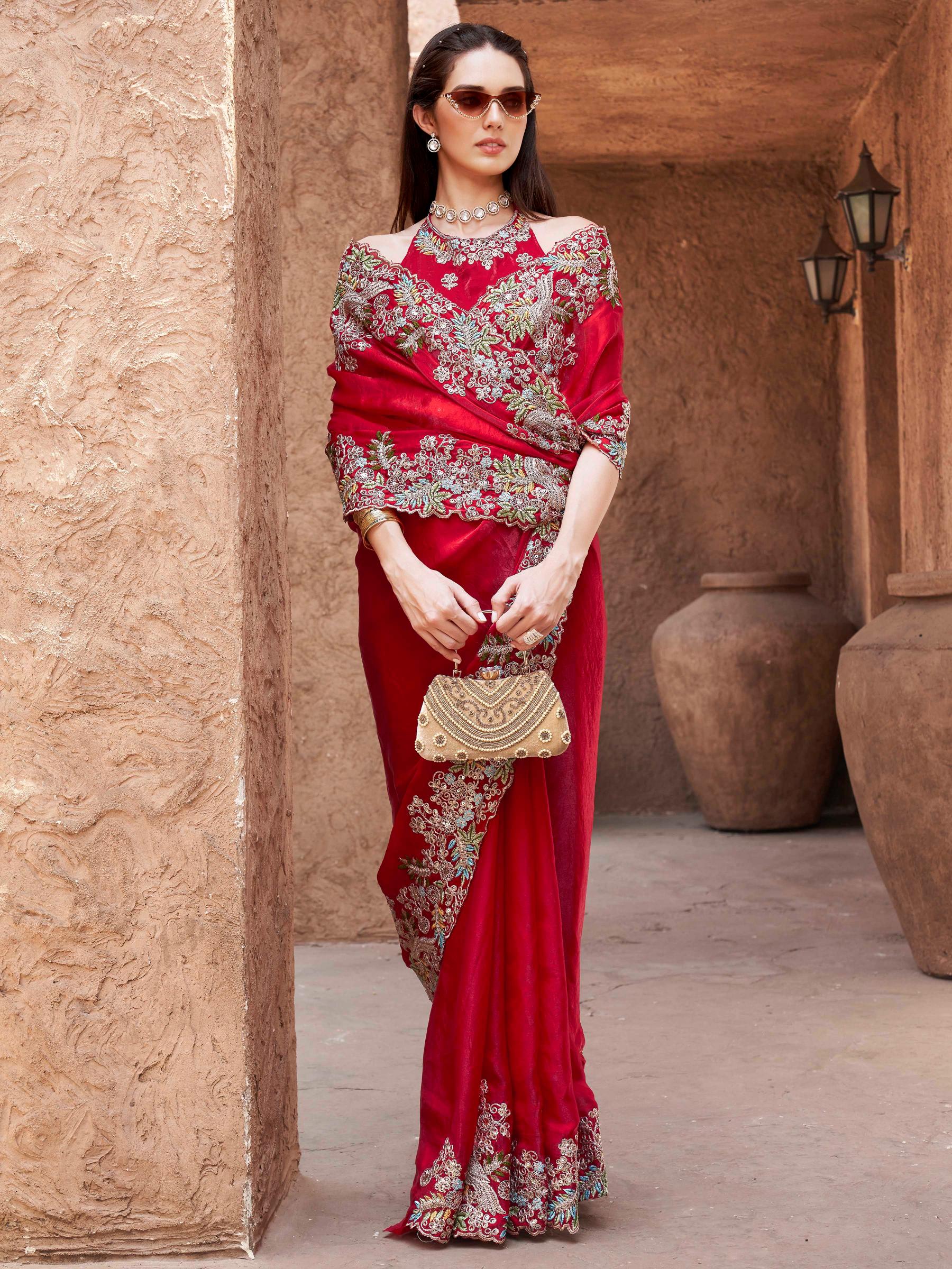 red colored designer jimmy choo saree with sequinned embroidery border